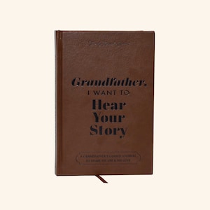 May include: A brown leather-bound journal with the title "Grandfather, I Want to Hear Your Story" and the subtitle "A Grandfather's Guided Journal to Share His Life & His Love".