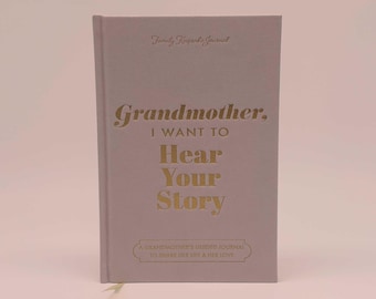 May include: A light purple journal with gold lettering that reads "Grandmother, I WANT TO Hear Your Story." The journal also has the text "Family Keepsake Journal" and "A Grandmother's Guided Journal to Share Her Life & Her Love."