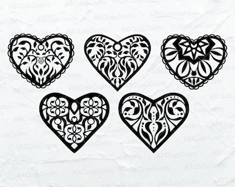 May include: Set of four black and white heart-shaped designs with intricate patterns. The hearts are isolated on a white background.