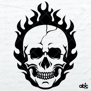 May include: Black and white silhouette of a skull with flames around it. The skull has a detailed design with a cracked forehead and a toothy grin.