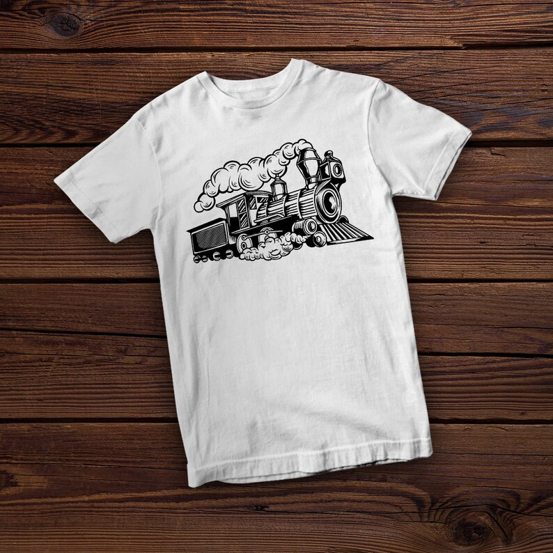 May include: White t-shirt with a black and white illustration of a vintage steam train with smoke coming from the chimney.