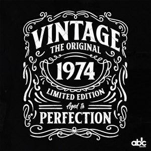 May include: Vintage design with ornate flourishes in white on a black background. The text reads "Vintage The Original 1974 Limited Edition Aged to Perfection".