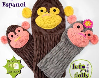 May include: Three crocheted monkey hand puppets. One is brown with a yellow face, one is pink with a brown face, and one is grey with a pink face. The puppets are labelled "let's crochet dolls".