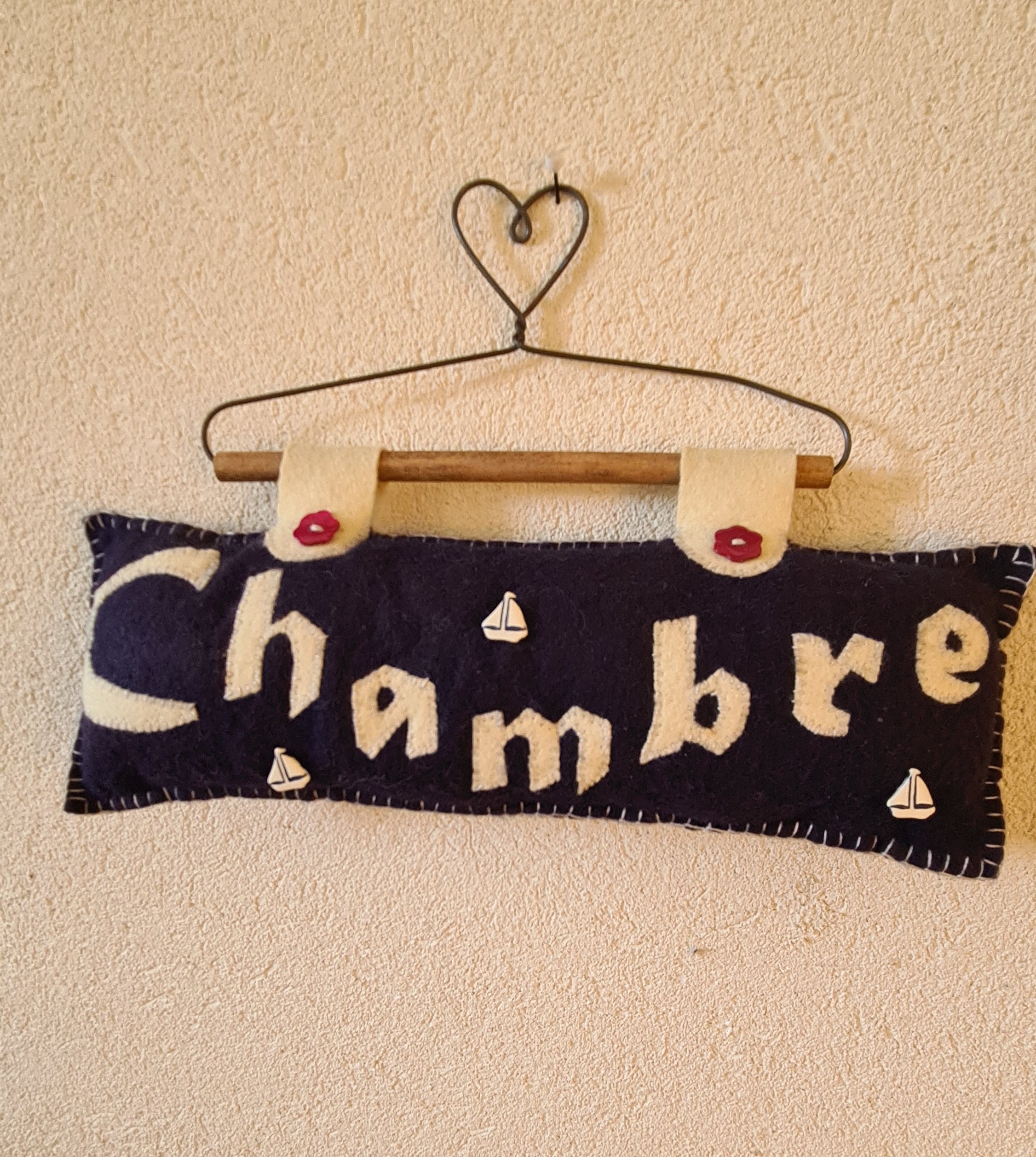 Une Tenture Murale en Feutre Disant Chambre