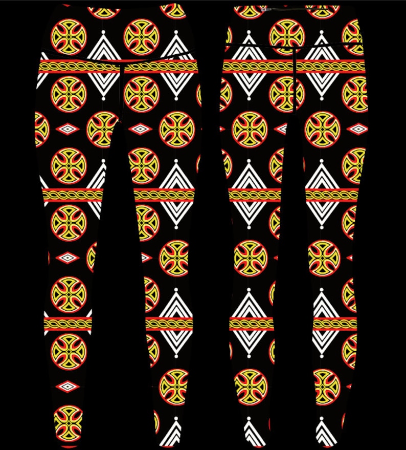 May include: Black leggings with a repeating pattern of yellow, red, and white geometric shapes. The pattern includes circles, diamonds, and crosses.