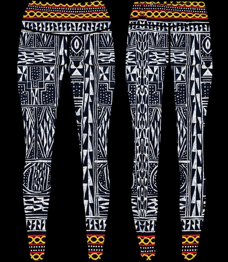 May include: Black leggings with a white geometric pattern. The leggings have a yellow and red band at the waist and ankles.