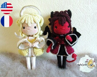 Puede incluir: Una muñeca de ángel de crochet con un vestido amarillo y alas blancas, y una muñeca de diablo de crochet con un vestido rojo y alas negras.