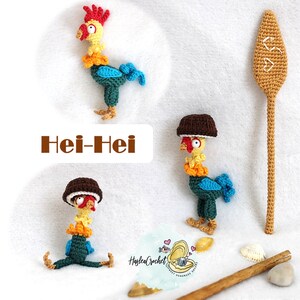 May include: Crocheted amigurumi toy of Hei Hei, the rooster from the movie Moana. The rooster is wearing a brown hat and has a yellow body, orange and blue feathers, and green legs. The text "Hei-Hei" is written in brown letters on a white background.