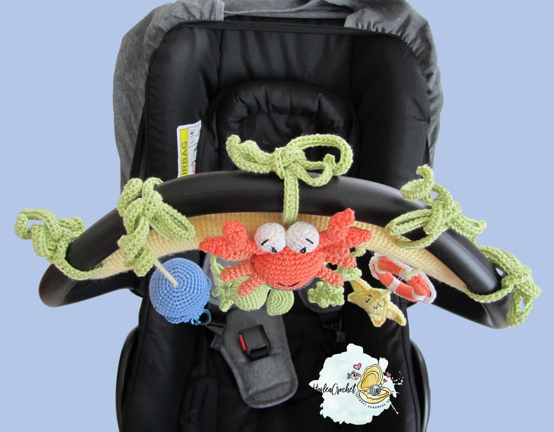 Amigurumi Häkelanleitung: Aktivitätskette für Baby Meeres Thema in Englisch und Französisch Bild 3