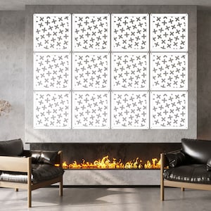 May include: Twelve white square wall panels with a repeating pattern of small gray plus signs. The panels are arranged in a 3x4 grid and are mounted on a gray concrete wall. A fireplace with flames is visible below the panels.