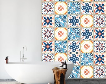May include: A bathroom with a white bathtub and a tiled wall with a blue, orange, and white geometric pattern. The tiles are arranged in a grid pattern.