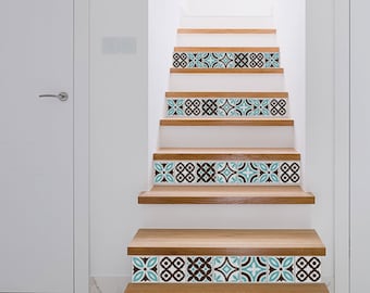 May include: A set of decorative stair treads with a blue and brown geometric pattern. The treads are made of wood and have a natural finish.