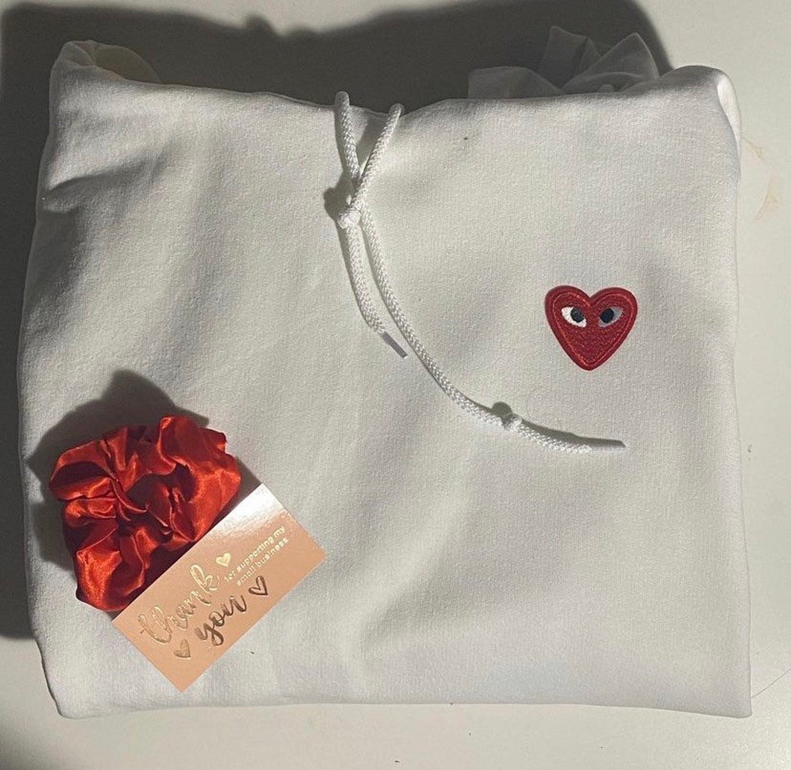 cdg hoodie black heart