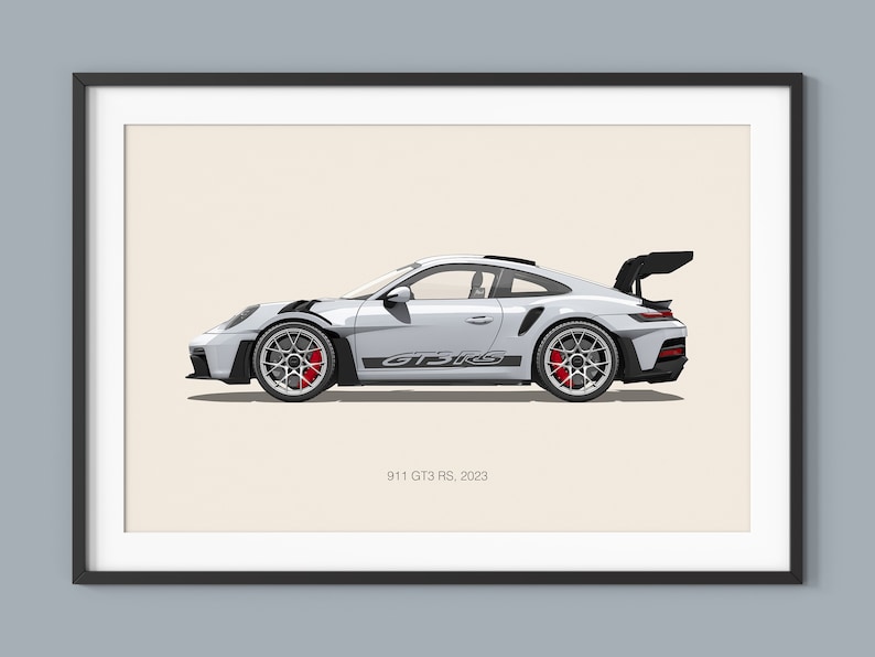 Puede incluir: Un Porsche 911 GT3 RS plateado, un coche deportivo de alto rendimiento, se muestra en vista de perfil. El coche tiene un gran aler&oacute;n trasero y detalles en negro. El texto "911 GT3 RS, 2023" est&aacute; impreso debajo del coche.
