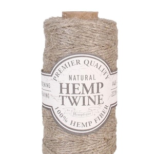 May include: A spool of natural hemp twine, labeled "Premier Quality Natural Hemp Twine 100% Hemp Fiber".