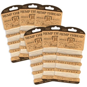 May include: Six spools of natural hemp thread, each wrapped in brown paper packaging with the text "Hemptique" and "Craft's Favorite" printed on it. The thread is 2mm thick and is a fine natural product of the earth.