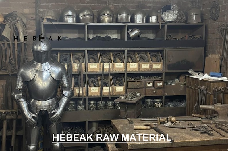 May include: A full suit of silver armor stands in a workshop filled with metal helmets, tools, and materials. The image includes the text "HEBEAK RAW MATERIAL". Shelves hold various items, suggesting a blacksmith or armorer's workspace.