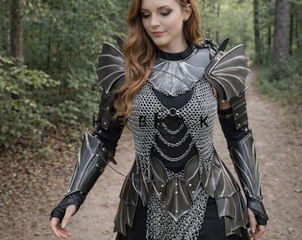 May include: A black and silver fantasy armor set with intricate detailing, including chainmail and layered plates. The armor features shoulder pauldrons and arm guards. The overall design suggests a medieval or fantasy theme.