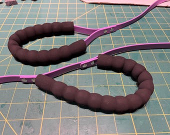 Accessorio con maniglia imbottita (solo a pagamento, guinzaglio non incluso)