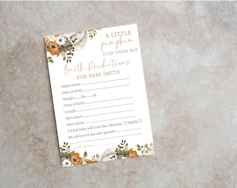 May include: A white card with a fall-themed design featuring pumpkins and flowers. The card has the text "A Little Pumpkin Is On Their Way" and "Birth Predictions For Baby Smith". The card includes a list of predictions for the baby's name, date of birth, weight, time of birth, length, eye color, hair color, and advice for the new parents.