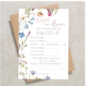 May include: A baby shower game card with floral watercolor illustrations. The card reads "BABY in bloom" and includes prompts for birth predictions, such as baby's name, date of birth, weight, and length in cm.