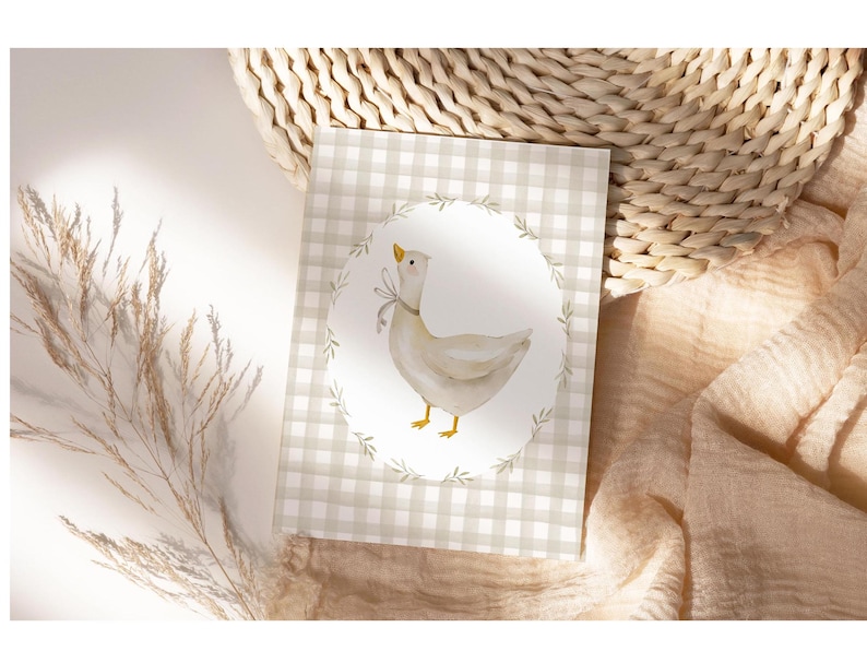 May include: A white goose with a brown and white checkered background. The goose is standing on a green branch with a white oval around it. The background is a light brown color.