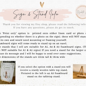 May include: A white sign with the text "Sign & Stand Info" and information about the different print options and stands available. The text includes the dimensions of the stands, which are 23 cm tall and 18 cm wide. An image of a welcome to Emma's baby shower sign with a wooden easel stand is shown on the left. A close-up of a wooden easel stand is shown on the right.