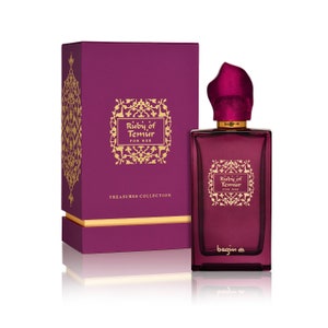 May include: A bottle of Ruby of Timur perfume for her, in a burgundy glass bottle with a gold cap and a burgundy box with gold lettering. The box says "Ruby of Timur for her" and "Treasures Collection".