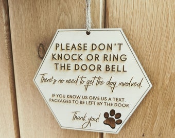 Please don't knock or ring the doorbell don't disturb the dog sign. Don't disturb the dog, our dog will bark sign.