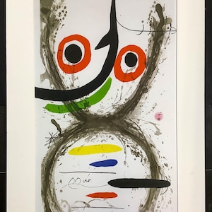 May include: Abstract art print featuring bold shapes and colors. The artwork includes large orange circles with black centers, a black curved line, and splashes of green, yellow, blue, and red. Signed "Miro" in the lower center.