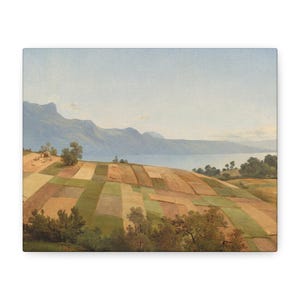 May include: A landscape painting depicting a rolling hillside divided into rectangular agricultural plots of varying shades of green, tan, and brown. In the background, a large body of water sits beneath a range of mountains under a pale sky.