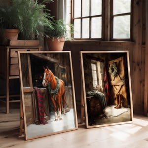 May include: Two framed art prints. One features a brown horse wearing a garland, standing in a snowy stable. The other depicts a rustic interior with a wreath on a wooden door and a blanket on a chest.