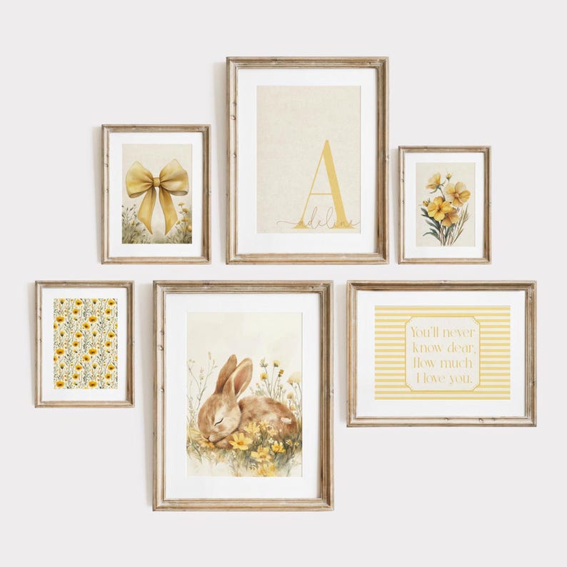 Cottagecore nursery gallery wall set featuring bunny rabbit art, yellow floral prints, personalized initial print, and sentimental nursery quotes.