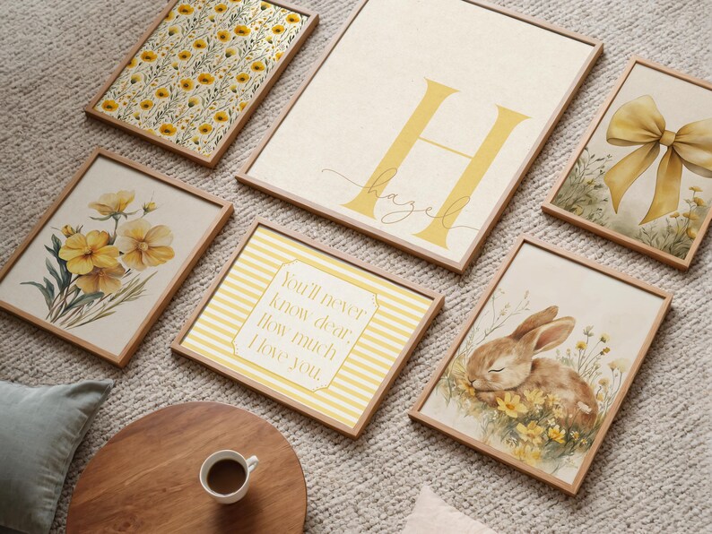 Soft yellow nursery gallery wall featuring bunny rabbit decor, daisy floral patterns, custom initial print, and whimsical cottagecore artwork.