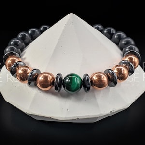 Pulsera de shungita hecha a mano: cobre, hematita y ojo de tigre