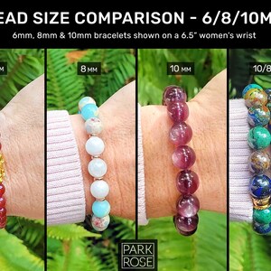 May include: A comparison of bead sizes for bracelets, showing 6mm, 8mm, and 10mm beads on a wrist. The bracelets are made with red, blue, and purple beads.