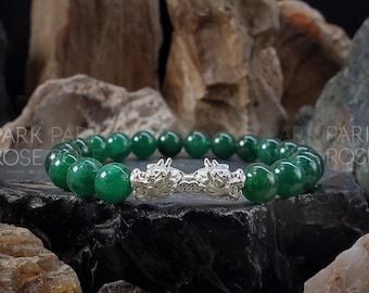 Sterling Silver Double Dragon Green Jade Bracelet: Lunar New Year Jewelry