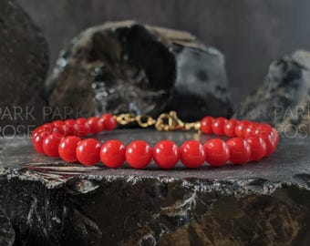 Red Pacific Coral Clasp Bracelet: April Birthstone Jewelry (5mm)