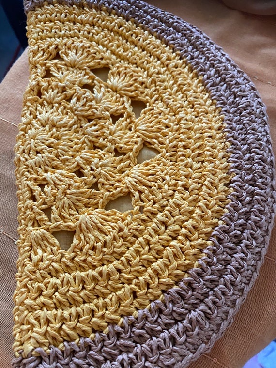 Half moon shaped clutch bag