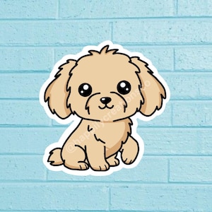 May include: A sticker of a cartoon dog with a light brown coat, big black eyes, and a black nose. The dog is sitting with its paws forward. The sticker has a white border and is set against a light blue brick wall.