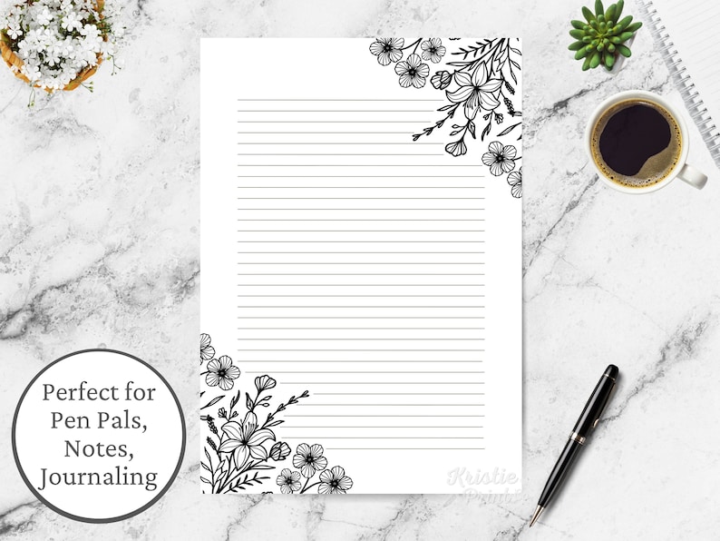 May include: Printable lined stationery paper with black floral corner designs. The paper is perfect for writing letters, notes, or journaling.