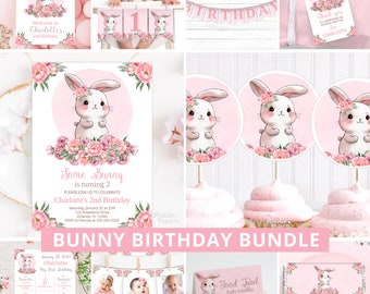 May include: A pink and white bunny birthday party printable bundle with a variety of items, including invitations, cupcake toppers, food labels, and a candy bar wrapper. The design features a cute bunny with pink flowers.