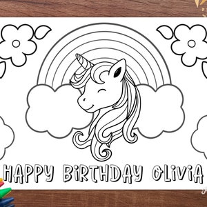 May include: A black and white coloring page featuring a unicorn with a rainbow and clouds. The text "HAPPY BIRTHDAY OLIVIA" is at the bottom of the page.