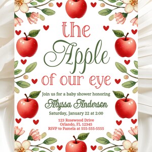 May include: A baby shower invitation with a red apple and green leaves, with the text "the Apple of our eye" and the name "Alyssa Anderson".