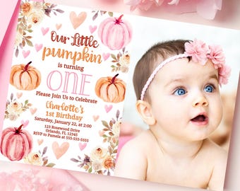 May include: A baby girl with blue eyes and a pink floral headband is featured on a birthday invitation. The invitation has a pumpkin theme with text that reads "Our Little Pumpkin is turning ONE".