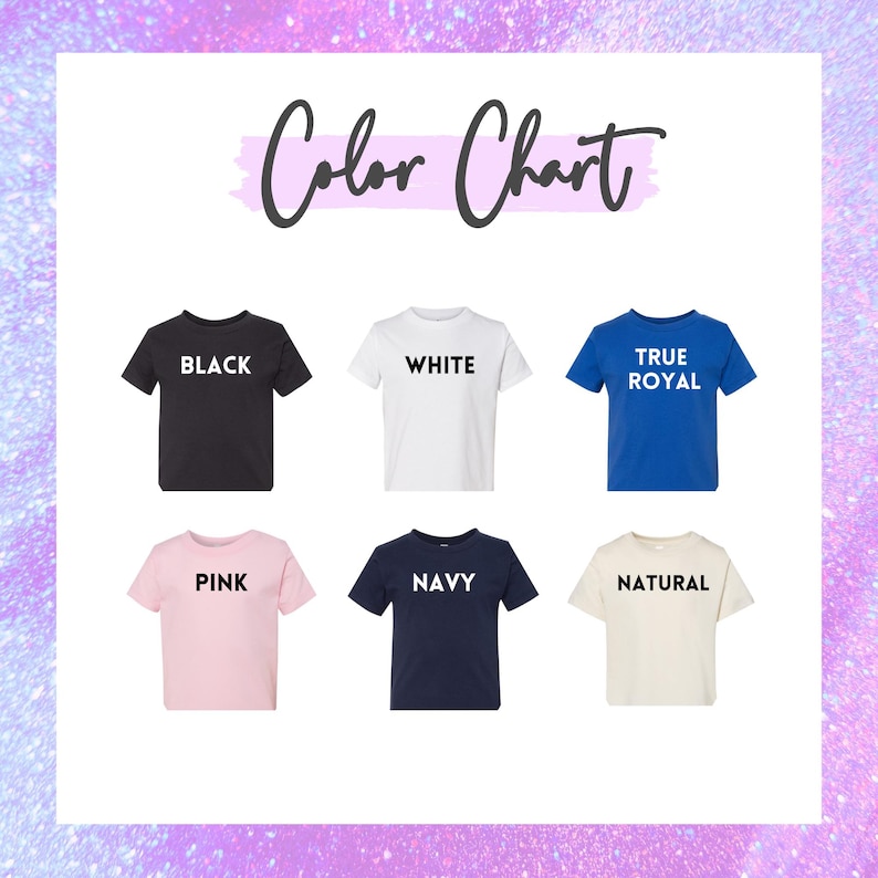 May include: A color chart displaying six short-sleeved t-shirts in various colors: black, white, true royal, pink, navy, and natural. Each shirt has its color name printed in a bold, sans-serif font.