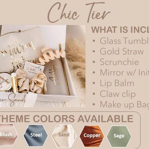 May include: A gift box with a cream makeup bag, gold accessories, and a mirror with an initial. The box includes a glass tumbler, scrunchie, lip balm, and claw clip. Theme colours available are blush, steel, sand, copper, and sage.