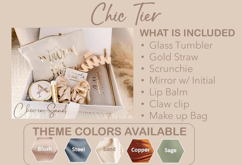 May include: A gift box with a cream makeup bag, gold accessories, and a mirror with an initial. The box includes a glass tumbler, scrunchie, lip balm, and claw clip. Theme colours available are blush, steel, sand, copper, and sage.