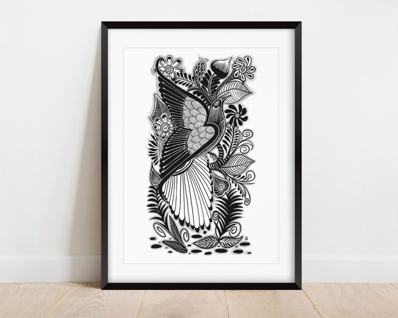 May include: Black and white line art print of a bird with intricate floral details. The bird is flying with its wings spread wide. The flowers are stylized and have a whimsical feel.