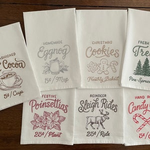 Haftowane ściereczki kuchenne z worka na mąkę na zimowy/świąteczny targ rolników - Gorący kakao, poncz jajeczny, ciasteczka, drzewa, gwiazdy betlejemskie, kuligi, laski cukrowe